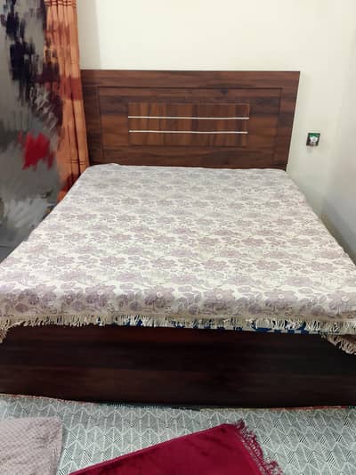 Queen size bed with mattress in good condition
