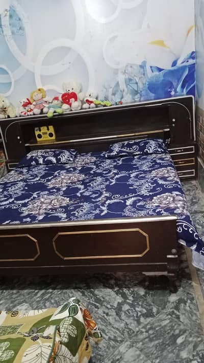 king size double bed in wooden