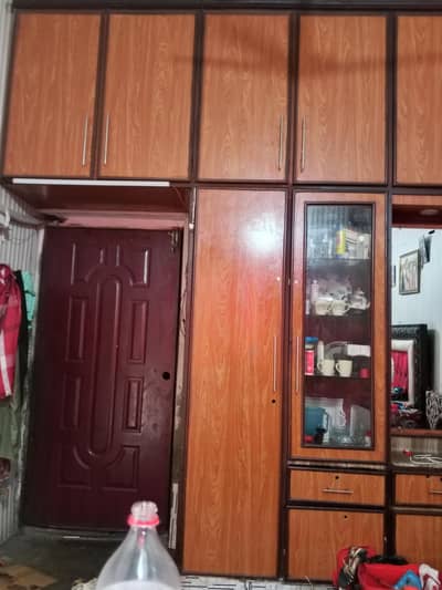 cabinet plus store room on the top plus dressing table ,plus showcase