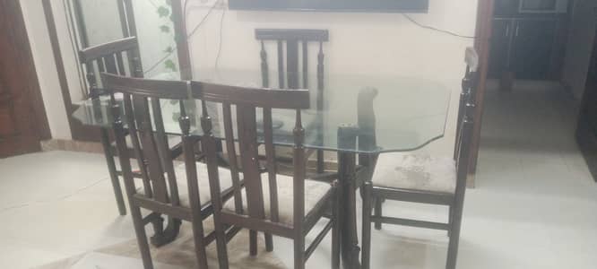 Glass  Dinning Table with 6 Chairs Up for Sale