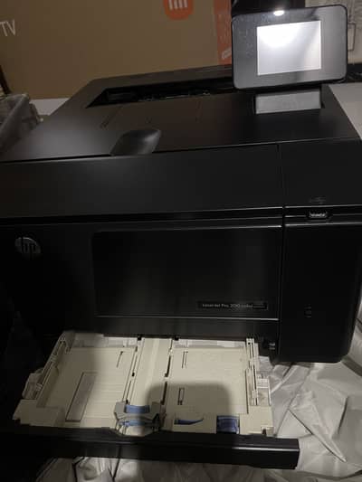 Almost New; with complete Color Toners packed in original conditions