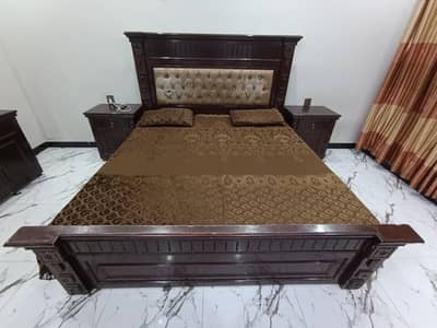 King size bed with 2 side tables and Dressing table. Slightly used.