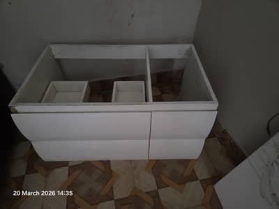 bathroom vanity with basin and tap