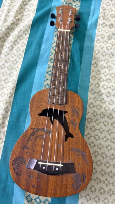 ukulele slightly used. perfect for beginners