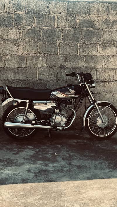 Honda 125 self start crome 26