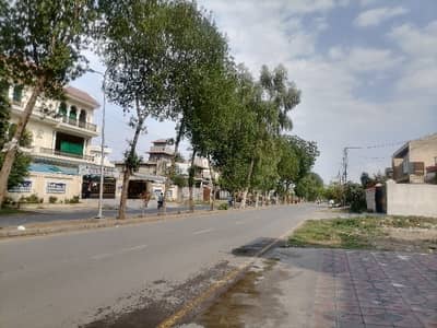 Prime Location 1 Kanal Commercial Plot Is Available On 80 Feet Main Road - Ideal For School Or Bank