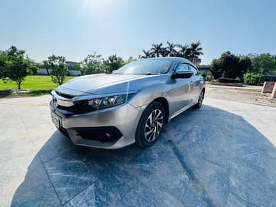 Honda civic totally genuine low mileage silver antique piece