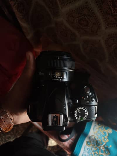 Nikon D3300 + 50mm Yongnuo 1.8 prime lens. + All accessories.