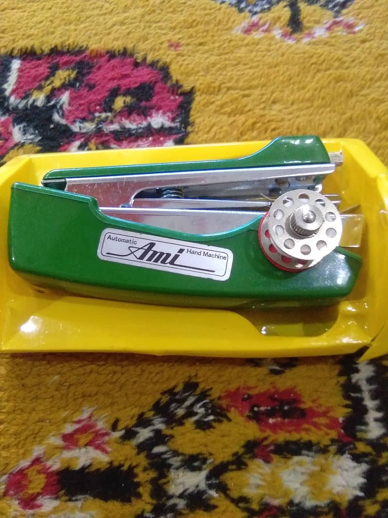 Mini Sewing machine 0
