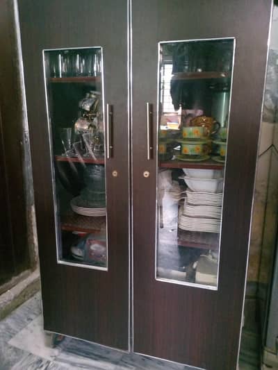 4 pure wooden chairs and one showcase .