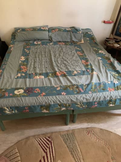 2 single beds combined to make 1 bed with mattress