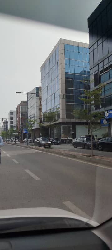 Outclass 3 Side Corner Building For Sale Main 26th Street Best Rental Income Fully Glass Elevation