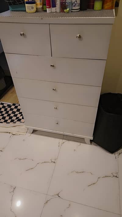 Bed with mattress ,side tables ,a Chester, three pieces storage setti