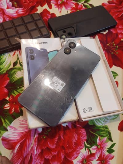 Samsung a06 All ok with box 4/128. GB 5 month warranty