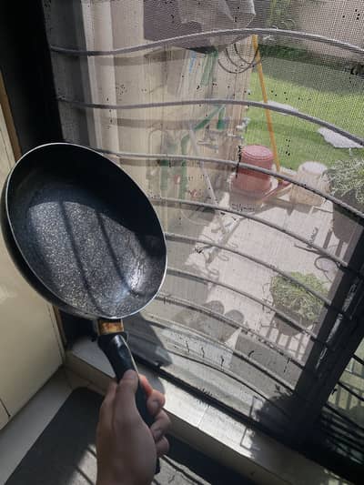 Used and New non stick pans