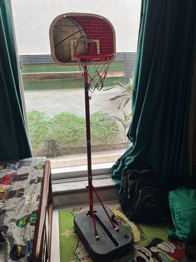 adjustable basketball stand with three balls