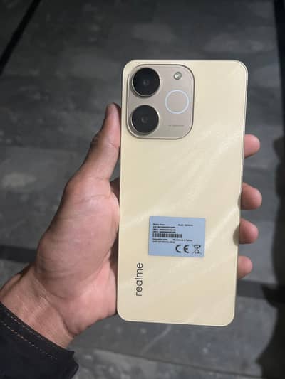 realme Not 70 , 10/10 with Box Charger 03258582366 Available number