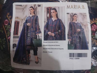 Maria. b. Unstitched suit