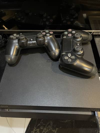 Playstation 4 slim jailbreak 1tb with 2 original controllers + 1 copy