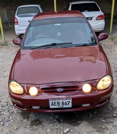 Kia Spectra 2002 model btr than Baleno,Caltus,city,civic,2odCorolla