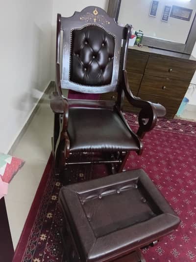 Rocking chair with rocking foot rest