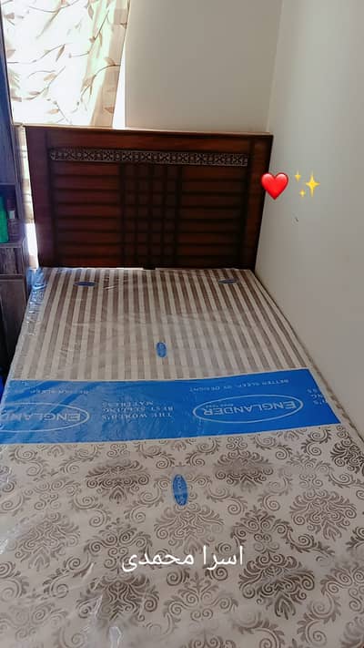 Almost brand new single bed along with new mattress, and small dressin