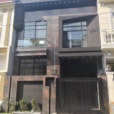 3 Marla double story house fr sale brand new home ideal and hot loction carpet road water electricity available 3D ultra model design Spanish look furnished home with wood work gated society 24 hour security guard near sozo water park near canal road near park double hite story
