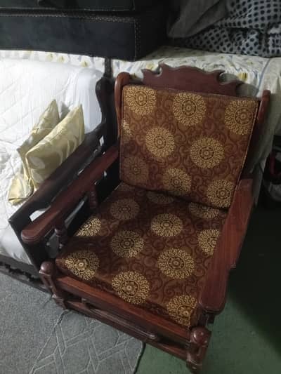 Wooden sofa with cusions