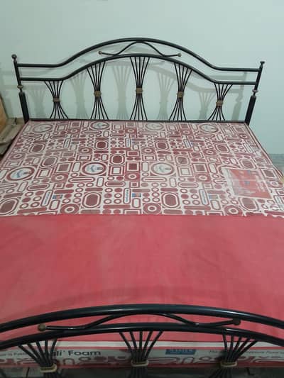 King size iron bed with mattress & dressing table available for sale.