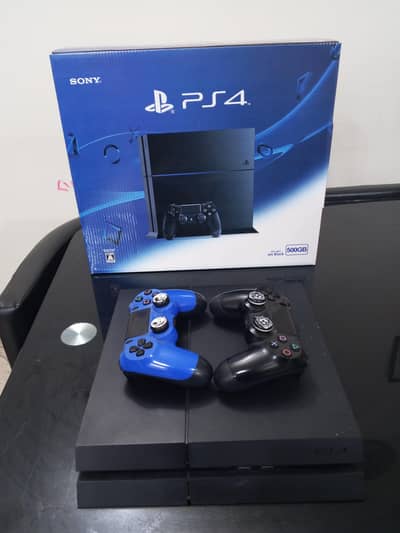 ps4 with two original controllers with 4month game subscription  500gb