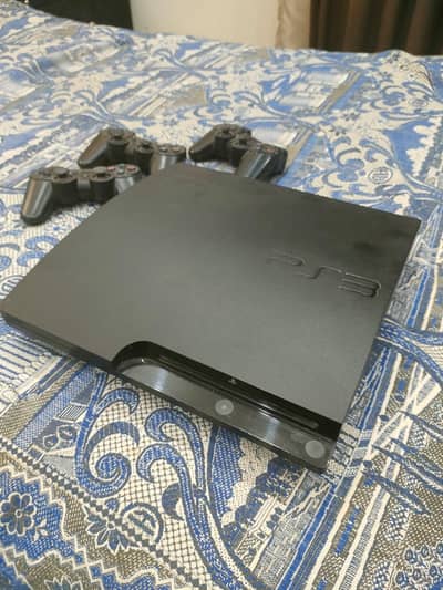 Ps3 with games and 3 orignal controllers ( online jailbreak)