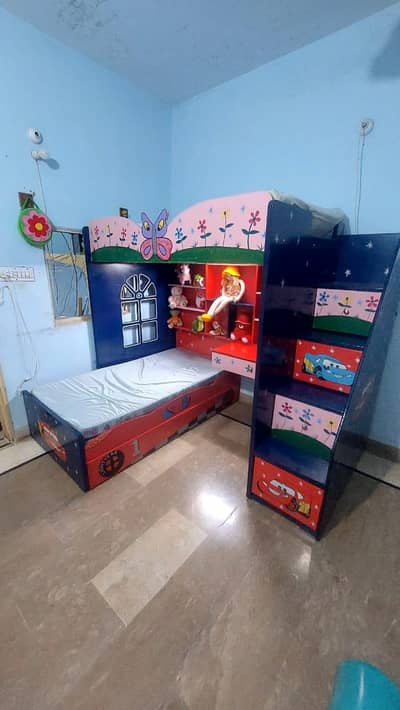 kids bed just like new  with tow mattress