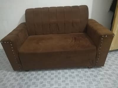 In brown colour 7 seater complete sofa set.