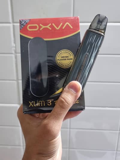 Oxva xlim3 Ultra Pod with 0.4 coil and box new condition no scratches