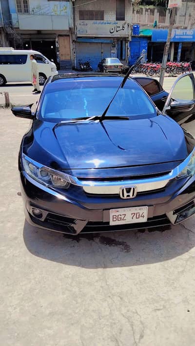 Civic with golden number 704