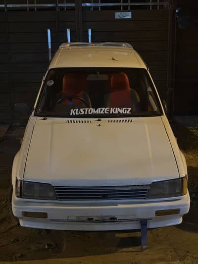 Charade 1986 2 door, white color just buy and drive