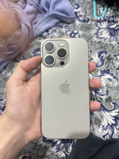 I phone 15 pro natural titanium