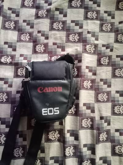 canon dslr d1000 18/55 lens