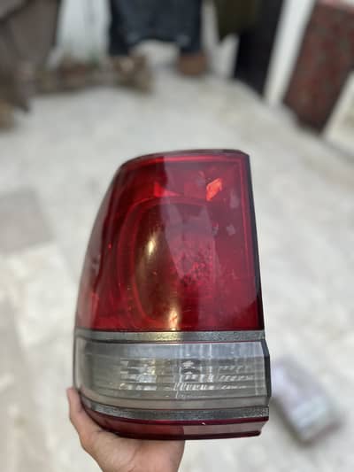 Land Cruisers break lights