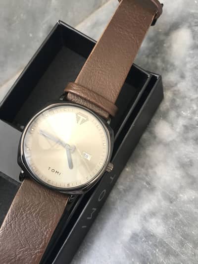 TOMI watch