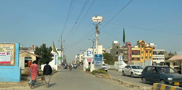 240 YARD PLOT FOR SALE IN SAADI TOWN BLOCK 5.