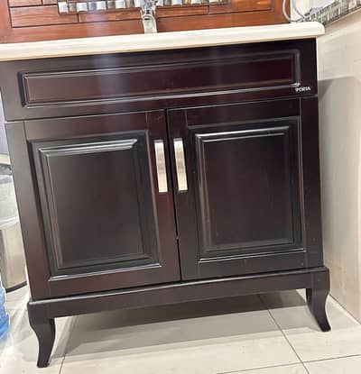 Basin with wooden cabinet
