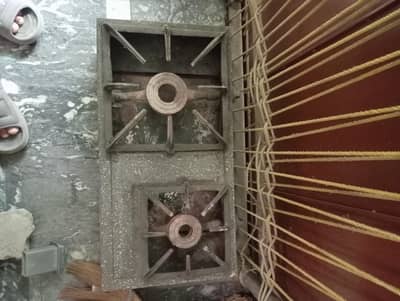 Two burner stove working condition urgent sale.