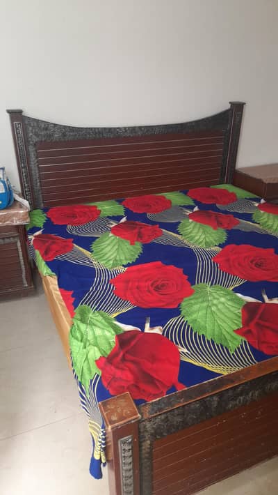 Used classic wooden bed with side tables