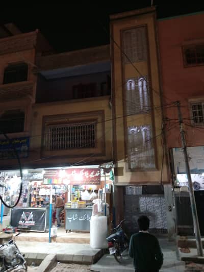 SECTOR 11-C/3. TWO SHOPS ALONG WITH G+2 HOUSE* 150 FT WIDE ROAD, COMMERCIAL AREA, NORTH KARACHI