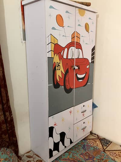 2 printed small beds and wardrobe