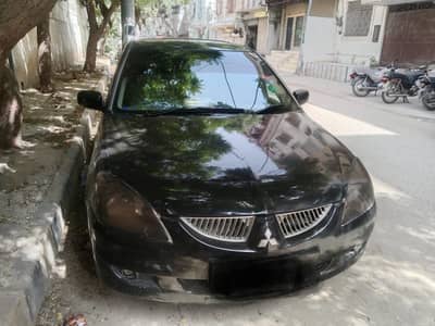 Mitsubishi lancer 1.6 GLX full Option