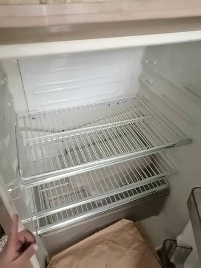 Dawlance medium size refrigerator almost new condition urgent sale
