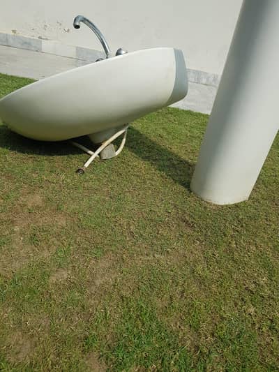 wash basin with stand and tap