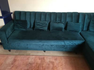 L Shaped sofa with pillows